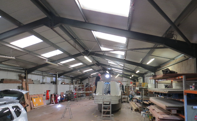 Interior of B1 Workshop unit , working on boats.